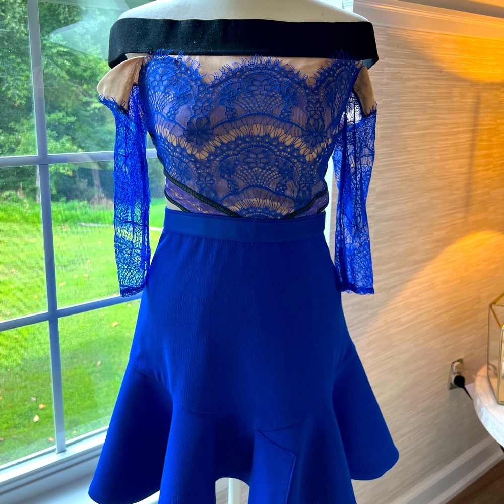 Three Floor Off the Shoulder Flounce Hem Fit and Flare Lace Dress.
